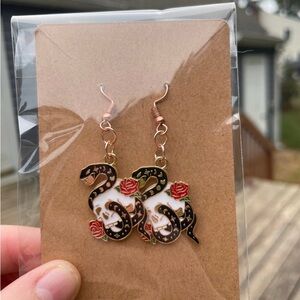 Hand-pieced Snake in Skull Earrings with Rose Design